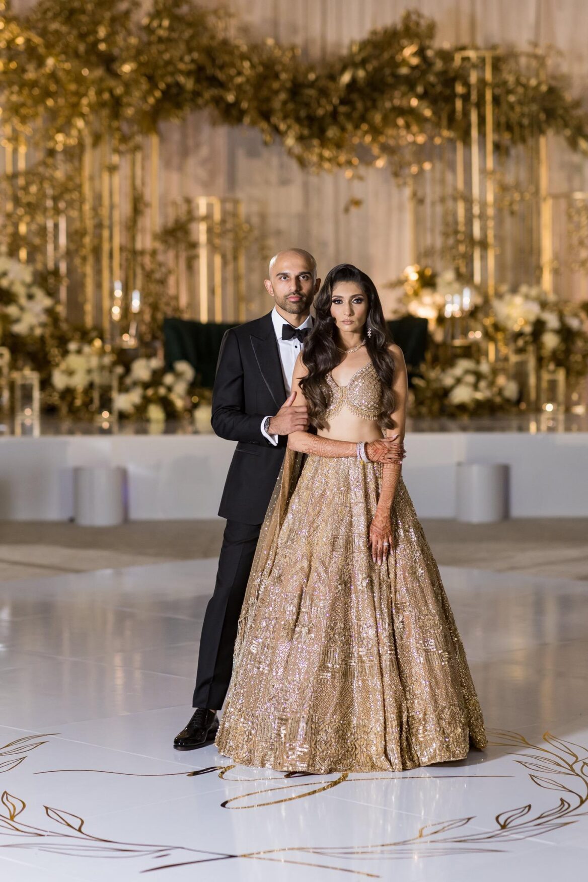 Bride and groom posing for a romantic wedding portrait